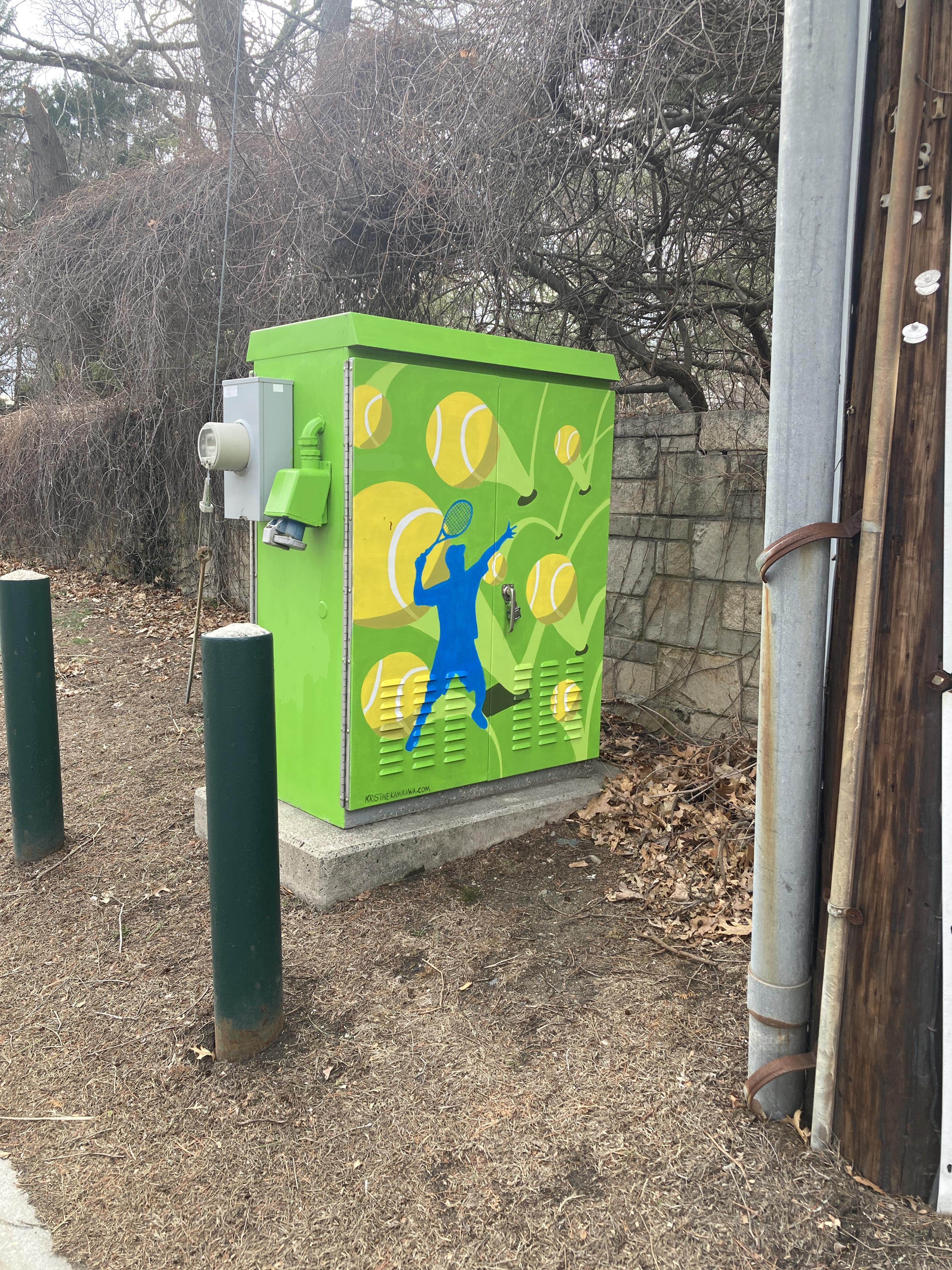 Man tennis player on utility box