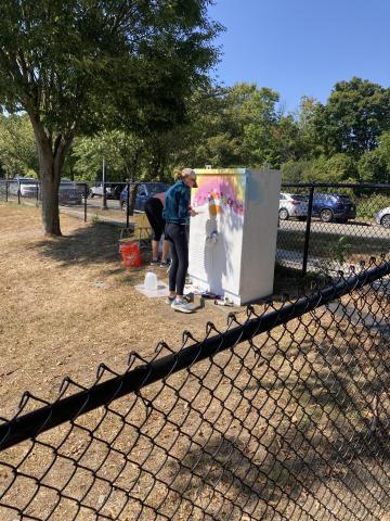Olivia and Jennifer Warner painting at the McCall skateboard park