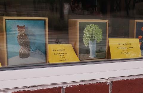 Art in August artworks in shop window