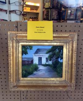 Framed oil painting of a building