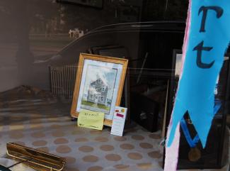 Art in August artworks in shop window